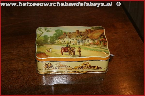 Oud blikje met afbeelding Boerenerf